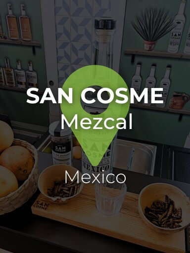 Bottle of Mezcal San Cosme, a Mexican artisanal beverage made from agave, with a sophisticated label, ideal for lovers of premium spirits._1