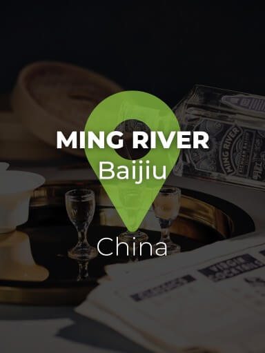Bottle of Ming River Baijiu pouring into glass_1